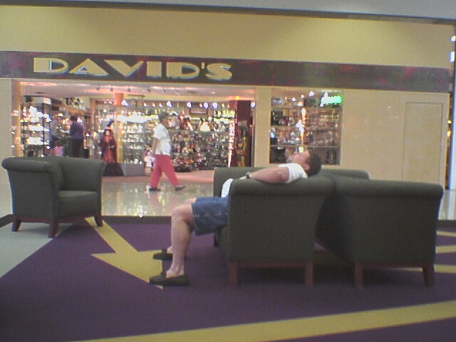 Dude sleeping in the mall