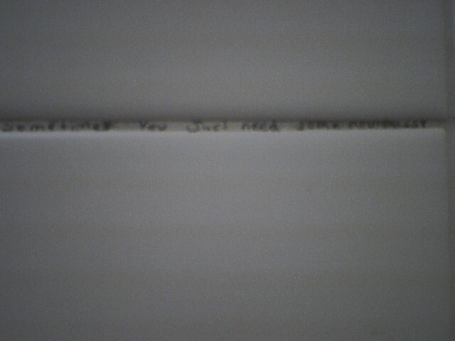 Sometimes you just need some new ____ (Written in the grout of a bathroom stall)