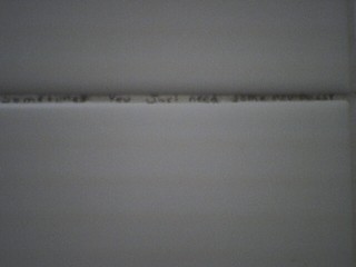 Sometimes you just need some new ____ (Written in the grout of a bathroom stall)