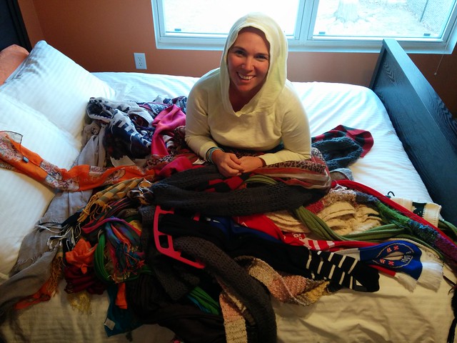 Spring cleaning. Kari attempts to sort through a few of her scarves.