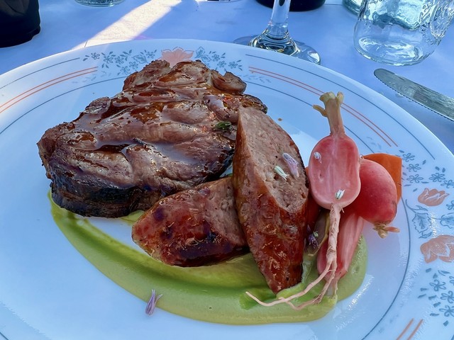 Pork shoulder steak with pork shoulder sausage and pickled veggies