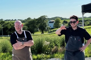 Chris and Diego chatting about the dinner