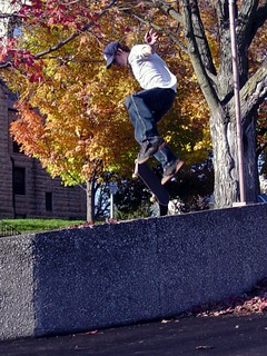 Kickflip off a narrow ledge in Mt Vernon