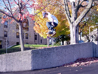 Kickflip off a narrow ledge in Mt Vernon