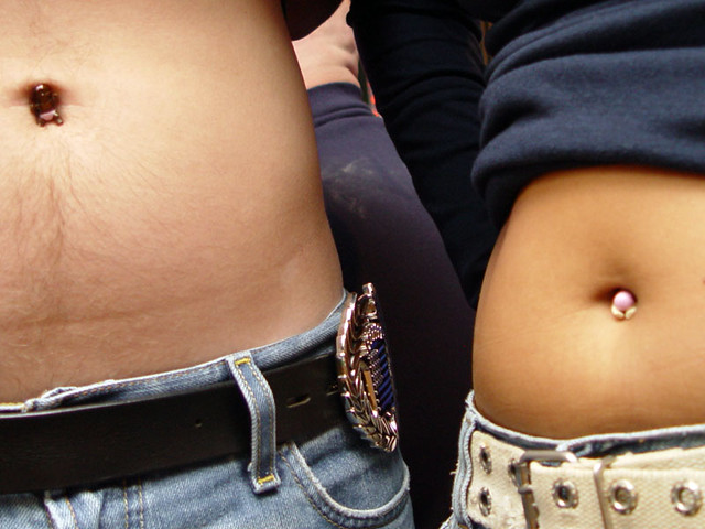 Those are little babies... in our belly buttons.  it was her idea.