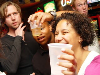 That appears to be a giant shot getting handed to tia