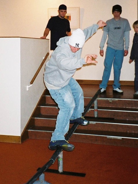 Zack sliding down the stairs