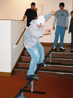 Zack sliding down the stairs