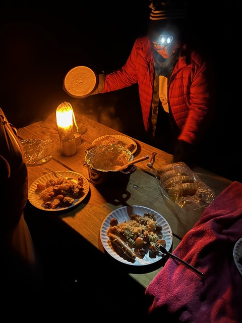 Dutch oven kraut + potatoes + brats