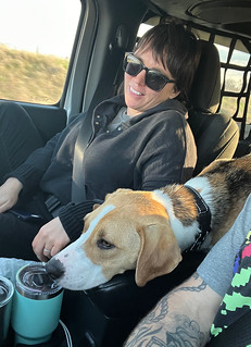 Durby, annoyed that he can't be in the front seat with us, just gets as close as possible