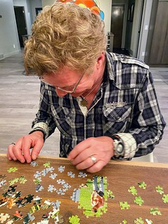 Dad building puzzles of himself shirtless