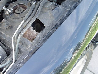 Rust above front drivers wheel well