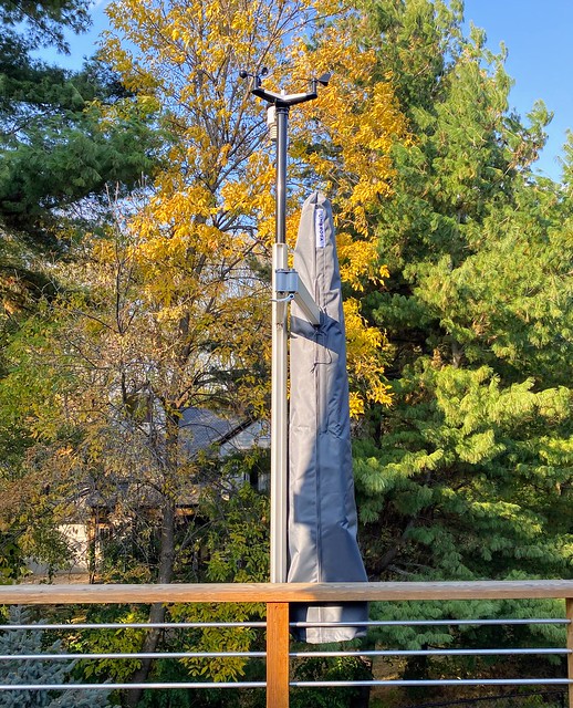 I mounted a weather station to my umbrella post because I am a nerd.