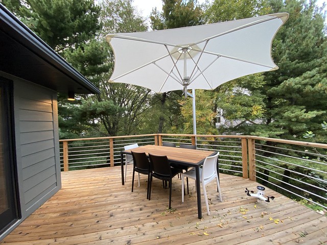 Umbrosa Paraflex Umbrella mounted to the deck railing