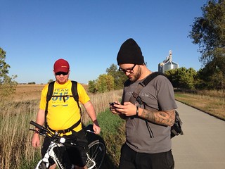 Biking - Checking the list. Photo by Tia O'Brien