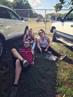 Attending the game from outside the fence and basking in the shade provided by the cars. Photo by...