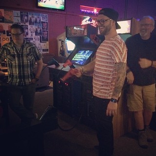 Bday boy playing a shooting game. Photo by Nicole Sutherland