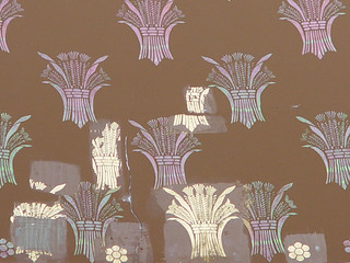 Apparently they wallpapered over the original gold wheat...