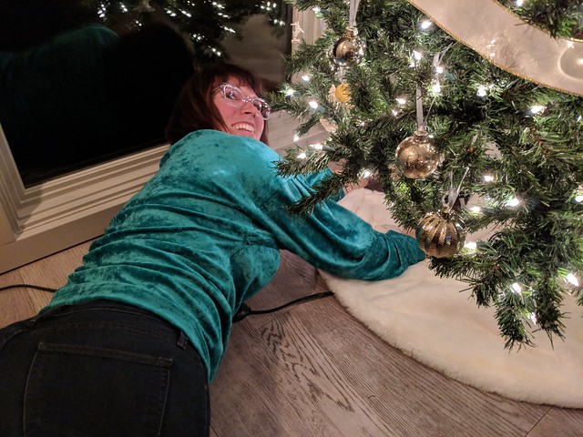 Gettin that new tree skirt just right