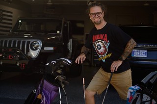 Happy boy cleanin up some clubs