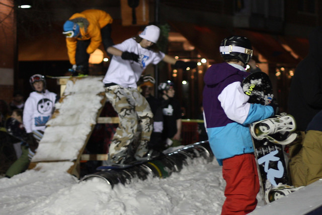Kid watching a dude 50-50 the kegs