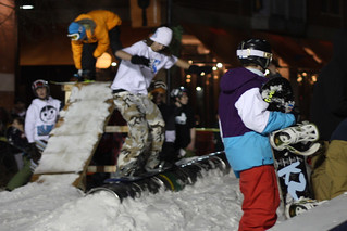 Snowboarding - Kid watching a dude 50-50 the kegs