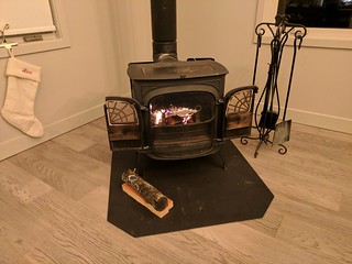 Finally got the wood stove put back together. First fire in our new place.
