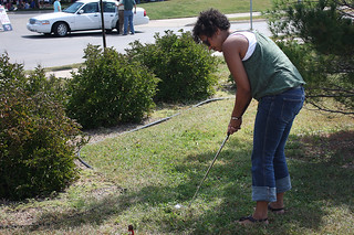 Drea trying beer golf