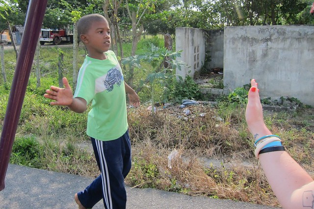 High fives from local kids