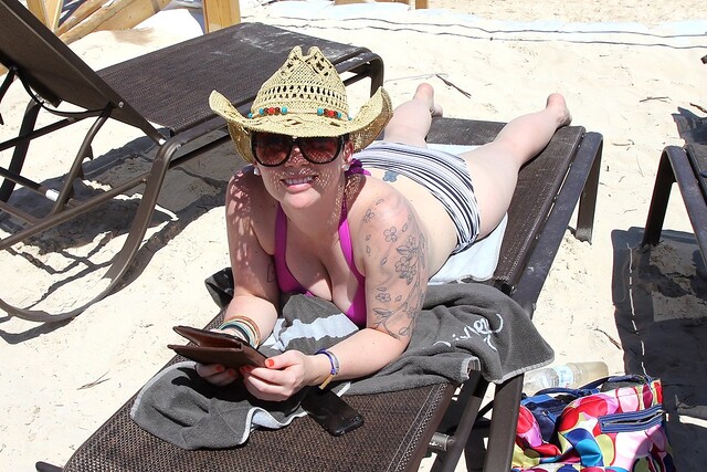 White girl nerdin out with her Kindle