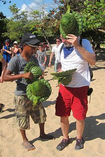 Buying a palm leaf hat from the locals