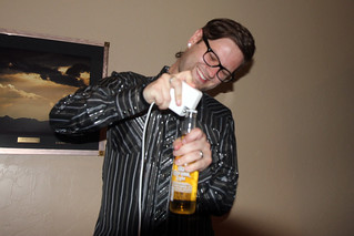 Tech - Opening a beer with an Apple power supply totally works.