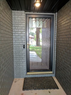 Front door + storm door before