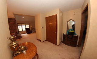 The main entryway (before). This awkward use of space (where the closet and vanity are) was rewor...