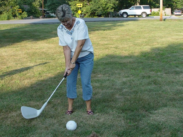 Grandma playing monster golf