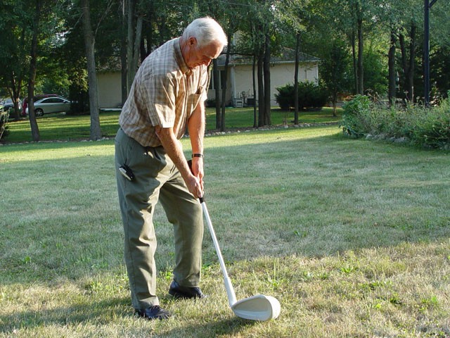 Grandpa playing monster golf