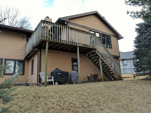 The back of the house and old "shed" below the deck.