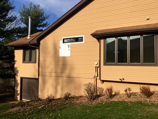 A new kitchen window goes in. We wanted the light, but not the view.