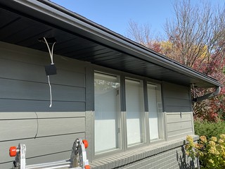 Adding some low-profile down lights to the front of the house