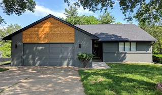 Exterior: remodeled. Next: new front door + landscaping.