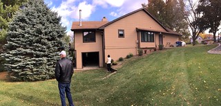The south side. With a glimpse into the weird shed below the dining room.