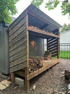 Repurposed some old cedar fence to help keep weather off the sides