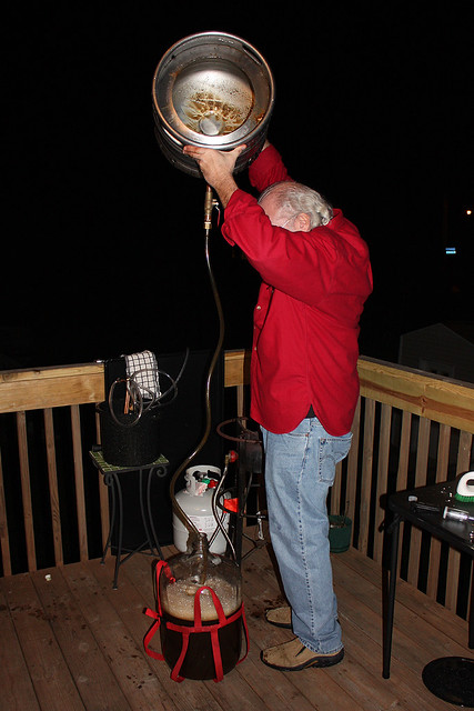 Dumping the rest of the brew into the carboy