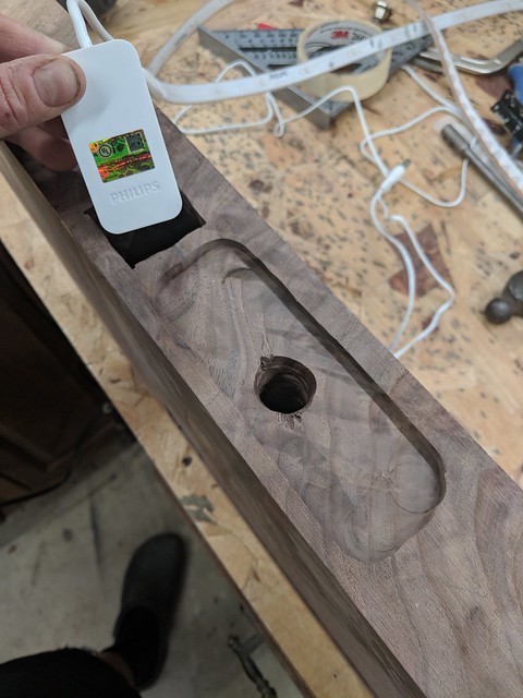 I bored a little container to conceal the annoying hardwired lightstrip coupler ... but I wound up not even needing to do this.