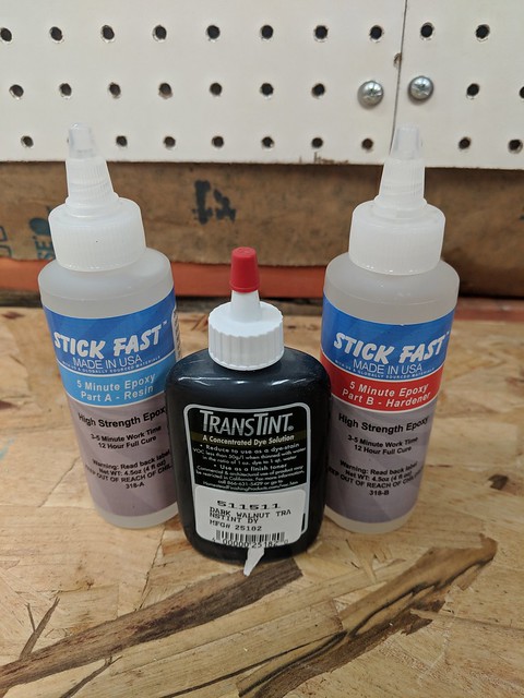 I bought some epoxy and dark walnut dye for filling the knots and cracks