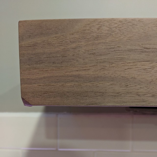 When I was almost done with everything, I did the dumbest thing ever and dropped the shelf on it's corner... I yelled. But then I just had to cut 3/8" off and re-sanded the end.