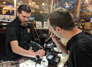 Cigar - This man had very fancy hair