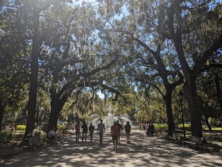 Dudes walking through Forsyth Park