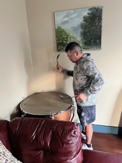 Nathan D - There was a giant kettle drum in the living room of our Air BnB... We banged it with plastic serv...