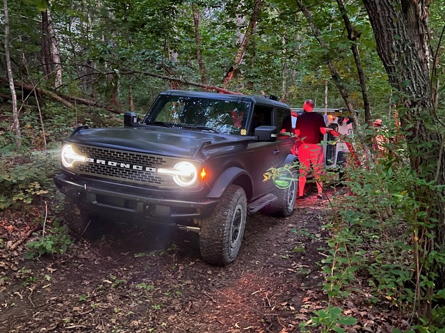 Dropping trees between the bronco and camper, haha
